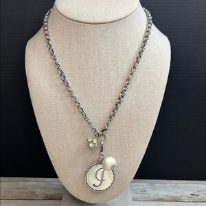 John Wind silver necklace features the 'Sorority Gal' J pendant and cotton pearl
